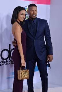 Actor Jamie Foxx and his daughter Corinne Foxx arrive for the annual American Music Awards held at Microsoft Theater in Los Angeles, on November 19, 2017.  LAP20171119126 JIMxRUYMEN
