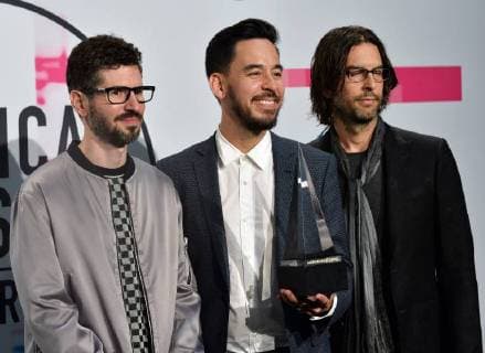 Brad Delson, Mike Shinoda and Rob Bourdon (L-R) of Linkin Park appear backstage after being named Favorite Alternative Rock Artist during the annual American Music Awards held at Microsoft Theater in Los Angeles, on November 19, 2017.  LAP20171119198 JIMxRUYMEN