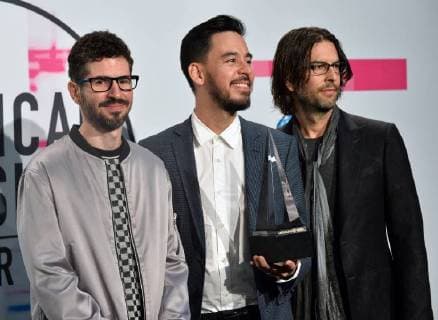 Brad Delson, Mike Shinoda and Rob Bourdon (L-R) of Linkin Park appear backstage after being named Favorite Alternative Rock Artist during the annual American Music Awards held at Microsoft Theater in Los Angeles, on November 19, 2017.  LAP20171119199 JIMxRUYMEN