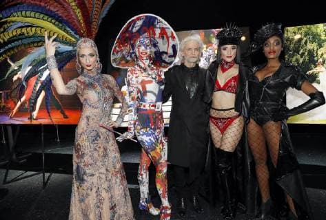 Dr Hermann Buehlbecker Sole owner LAMBERTZ with models at the LAMBERTZ Fine Art calendar presentation in the Friedrichstadtpalast Berlin