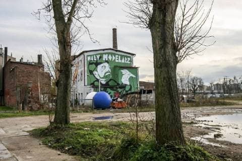 Mural depicting the portrait of a Minister of Defence Antoni Macierwicz with a paper plane in Hand and Little modeler inscription is seen on Gdansk, Poland on 26 November 2017 Mural made by artist Mariusz Waras refers to the indolence of the Minister of Defense Maciereiwcz in reforming the Polish Army, to the announced purchases of military equipment and the broken contract for the delivery of French multi-role helicopters. Gdansk, 26.11.2017 Mural Mariusza Warasa przedstawiajacy ministra Obrony Narodowej jako Malego Modelarza. Minister w wojskowym uniformie trzyma w reku papierowy model samolotu na gorze widnieje napis Maly Modelarz. fot. Michal Fludra Newspix.pl --- Newspix.pl FLUMI_26112017_18706