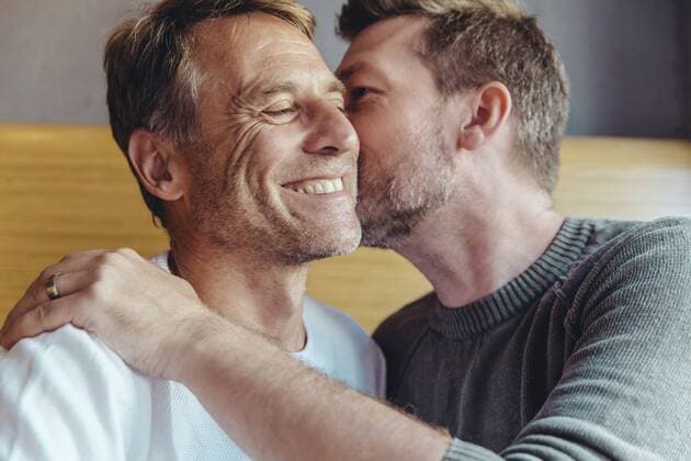Portrait of an affectionate gay couple model released Symbolfoto property released  MFF03887