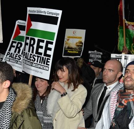 After attending a Tag Heuer party thrown in her honour in London, American fashion model Bella Hadid is pictured joining in on an anti-Trump Palestinian demonstration outside the American Embassy. Hadid is of Palestinian descent and spent a few minutes with the protestors after President Donald Trump made the decision to recognise Jerusalem as the capital of Israel. DECEMBER 8th 2017  LTNx172831
