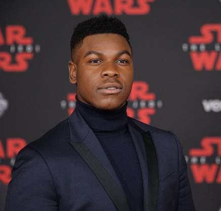 Cast member John Boyega attends the premiere of the sci-fi motion picture fantasy Star Wars: The Last Jedi at the Shrine Auditorium in Los Angeles on December 9, 2017. Storyline: Having taken her first steps into the Jedi world, Rey joins Luke Skywalker on an adventure with Leia, Finn and Poe that unlocks mysteries of the Force and secrets of the past.  LAP20171209204 JIMxRUYMEN