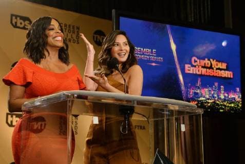Actresses Niecy Nash (L) and Olivia Munn announce nominations onstage for the 24th annual SAG Awards at the Pacific Design Center in West Hollywood, California on December 13, 2017. Winners will be announced during a live Simulcast on Sunday, January 21.  LAP2017121303 JIMxRUYMEN