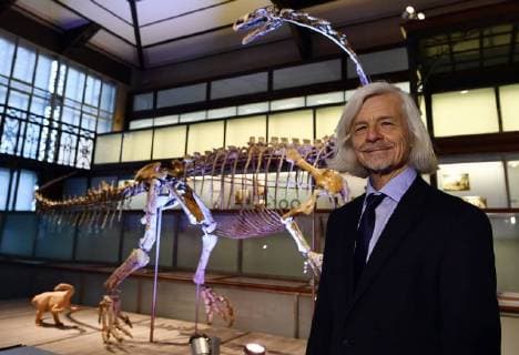 palaeontologist Ben Pabst poses for the photographer during the presentation of the skeleton of a Plateosaurus dinosaur named Ben, at the Museum of Natural Sciences (Museum voor Natuurwetenschappen - Musee des Sciences naturelles) in Brussels, Thursday 14 December 2017.  ERICxLALMAND 05218428