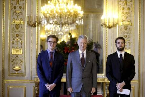 Ruben Matthys, King Philippe - Filip of Belgium and Milan Berckmans pictured during the award ceremony of Belgodyssee at Royal Palace, Thursday 14 December 2017 in Brussels.  NICOLASxMAETERLINCK 05218698