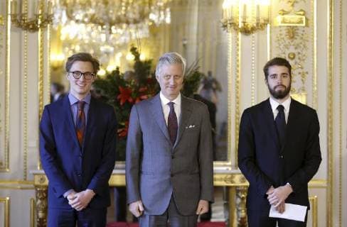 Ruben Matthys, King Philippe - Filip of Belgium and Milan Berckmans pictured during the award ceremony of Belgodyssee at Royal Palace, Thursday 14 December 2017 in Brussels.  NICOLASxMAETERLINCK 05218699