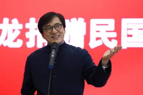 Hong Kong kungfu star Jackie Chan attends a ceremony to mark his donation of an antique street lamp and six replicas to the Shanghai History Museum in Shanghai, China, 17 December 2017. Jackie Chan on Sunday (17 December 2017) donated an antique street lamp and six replicas to the Shanghai History Museum. The 63-year-old film actor posed for pictures with one of the replicas during a ceremony at the museum at 325 Nanjing Road W. The original lamp is undergoing restoration, the museum said. Chan, a keen antiques collector outside his movie career, said he spotted a number of ornate street lamps on sale while filming in the United States many years ago. The Taiwan couple selling them said they were from Shanghai during the Republic of China (1912-1949) period. He bought 19 lamps from the couple at up to US$4,500 each and had them shipped  pbu726482_01