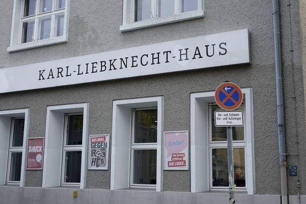 08 11 2017 Middle small Alexander Street Berlin Karl Liebknecht House and traffic sign Karl Liebknecht House Office building building offices listed party the left Karl Liebknecht Marxist antimilitarist signs parking ban