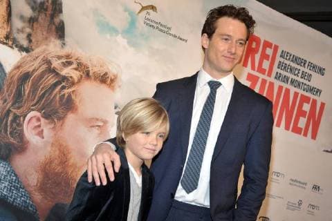 Arian Montgomery Alexander Fehling arriving for the premiere three peaks in Kino international in Berlin on 20 12 2017