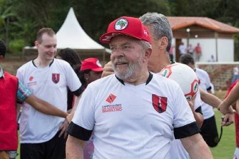 December 23, 2017 - Sao Paulo, Sao Paulo, Brazil - Former President of Brazil, LUIZ INACIO LULA DA SILVA, attends a soccer game during the inauguration of the soccer field in honor of Doctor Socrates, Brazilian soccer player who died in 2011. The place was built by the Landless WorkersÃ¢â‚¬â ¢ Movement - MST. Sao Paulo Brazil - ZUMAl146 20171223_zaf_l146_022 Copyright: xPauloxLopesx