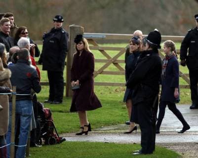 Princess Beatrice, left, Princess Eugenie, leave the St. Mary Magdalene Church Sunday morning service, on Christmas Eve, in Sandringham, Norfolk, on December 24, 2017. 