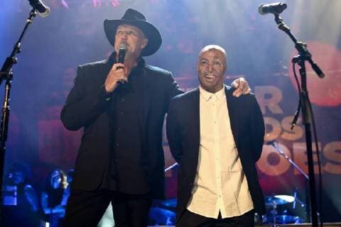 USA: 2017 Wall Street Rocks NEW YORK, NY - NOVEMBER 29: Musician Trace Adkins (L) and J.R. Martinez at America Salutes You and Wall Street Rocks Presents Guitar Legends For Heroes at Terminal 5 on November 29, 2017 in New York City. New York New York United States  DebbyxWong