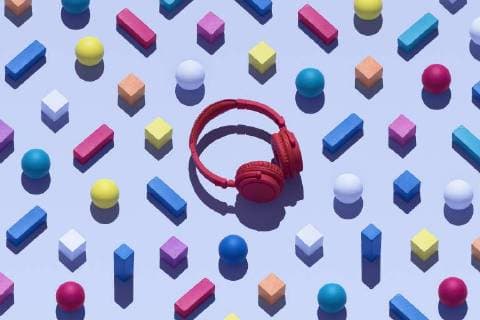 Red wireless headphones surrounded by geometric shapes, 3D Rendering  DRBF00039