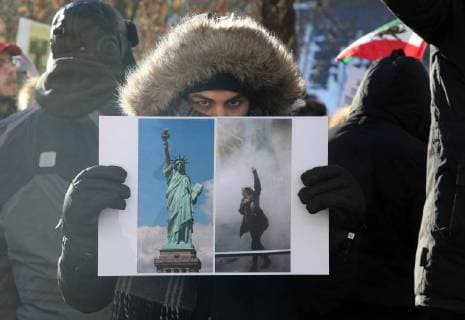 January 6, 2018 - Toronto, Ontario, Canada - Hundreds of Canadians take part in a protest against the Islamic Republic of Iran in Toronto, Ontario, Canada, on January 06, 2018. Protestors showed their solidarity with anti-government demonstrators in Iran and their support of a national uprising of the Iranian people. Protesters called for a regime change for social justice and freedom and democracy in Iran. There was a also a call that power in Iran be returned to Reza Pahlavi, the former Crown Prince of Iran and the last heir apparent to the defunct throne of the Imperial State of Iran and the current head of the exiled House of Pahlavi. Toronto Canada  - ZUMAn230 20180106_zaa_n230_1123 Copyright: xCreativexTouchxImagingxLtdx