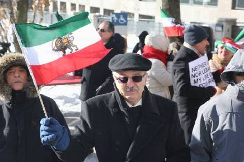 January 6, 2018 - Toronto, Ontario, Canada - Hundreds of Canadians took part in a protest against the Islamic Republic of Iran in Toronto, Ontario, Canada, on January 06, 2018. Protestors showed their solidarity with anti-government demonstrators in Iran and their support of a national uprising of the Iranian people. Protesters called for a regime change for social justice and freedom and democracy in Iran. There was a also a call that power in Iran be returned to Reza Pahlavi, the former Crown Prince of Iran and the last heir apparent to the defunct throne of the Imperial State of Iran and the current head of the exiled House of Pahlavi. Toronto Canada  - ZUMAn230 20180106_zaa_n230_1131 Copyright: xCreativexTouchxImagingxLtdx