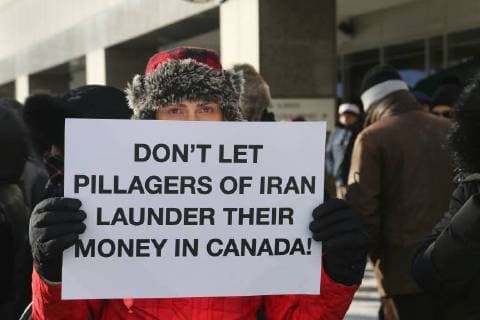 January 6, 2018 - Toronto, Ontario, Canada - Hundreds of Canadians take part in a protest against the Islamic Republic of Iran in Toronto, Ontario, Canada, on January 06, 2018. Protestors showed their solidarity with anti-government demonstrators in Iran and their support of a national uprising of the Iranian people. Protesters called for a regime change for social justice and freedom and democracy in Iran. There was a also a call that power in Iran be returned to Reza Pahlavi, the former Crown Prince of Iran and the last heir apparent to the defunct throne of the Imperial State of Iran and the current head of the exiled House of Pahlavi. Toronto Canada  - ZUMAn230 20180106_zaa_n230_1132 Copyright: xCreativexTouchxImagingxLtdx