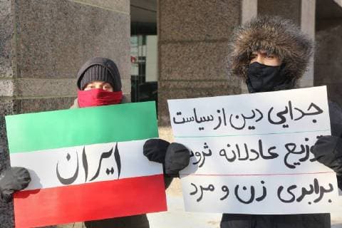 January 6, 2018 - Toronto, Ontario, Canada - Hundreds of Canadians took part in a protest against the Islamic Republic of Iran in Toronto, Ontario, Canada, on January 06, 2018. Protestors showed their solidarity with anti-government demonstrators in Iran and their support of a national uprising of the Iranian people. Protesters called for a regime change for social justice and freedom and democracy in Iran. There was a also a call that power in Iran be returned to Reza Pahlavi, the former Crown Prince of Iran and the last heir apparent to the defunct throne of the Imperial State of Iran and the current head of the exiled House of Pahlavi. Toronto Canada  - ZUMAn230 20180106_zaa_n230_1137 Copyright: xCreativexTouchxImagingxLtdx