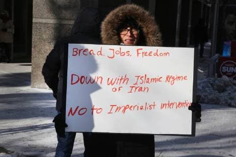 January 6, 2018 - Toronto, Ontario, Canada - Hundreds of Canadians take part in a protest against the Islamic Republic of Iran in Toronto, Ontario, Canada, on January 06, 2018. Protestors showed their solidarity with anti-government demonstrators in Iran and their support of a national uprising of the Iranian people. Protesters called for a regime change for social justice and freedom and democracy in Iran. There was a also a call that power in Iran be returned to Reza Pahlavi, the former Crown Prince of Iran and the last heir apparent to the defunct throne of the Imperial State of Iran and the current head of the exiled House of Pahlavi. Toronto Canada  - ZUMAn230 20180106_zaa_n230_1157 Copyright: xCreativexTouchxImagingxLtdx