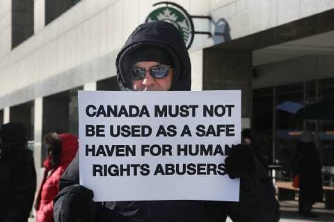 January 6, 2018 - Toronto, Ontario, Canada - Hundreds of Canadians take part in a protest against the Islamic Republic of Iran in Toronto, Ontario, Canada, on January 06, 2018. Protestors showed their solidarity with anti-government demonstrators in Iran and their support of a national uprising of the Iranian people. Protesters called for a regime change for social justice and freedom and democracy in Iran. There was a also a call that power in Iran be returned to Reza Pahlavi, the former Crown Prince of Iran and the last heir apparent to the defunct throne of the Imperial State of Iran and the current head of the exiled House of Pahlavi. Toronto Canada  - ZUMAn230 20180106_zaa_n230_1138 Copyright: xCreativexTouchxImagingxLtdx