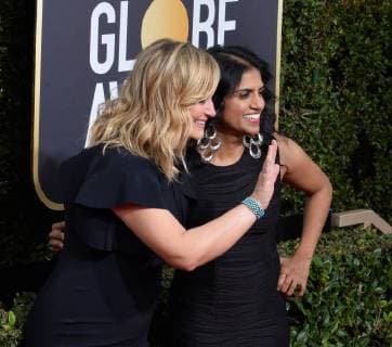 Actor Amy Poehler and activist Saru Jayaraman attend the 75th annual Golden Globe Awards at the Beverly Hilton Hotel in Beverly Hills, California on January 7, 2018.  LAP20180107893 JIMxRUYMEN