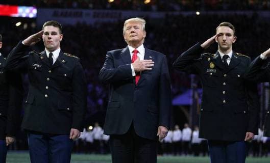 January 8, 2018 - GA, USA - President Donald Trump participates in the national anthem at the College Football Playoff National Championship at Mercedes-Benz Stadium on Monday, Jan. 8, 2018 in Atlant, Ga. USA - ZUMAm67_ 32025677sp Copyright: xCurtisxComptonx