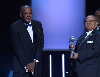 Honoree William Lucy (L) accepts the Chairman s Award from Chairman of the NAACP Board of Directors Leon W. Russell and Bishop Charles Blake onstage during the 49th NAACP Image Awards at the Pasadena Civic Auditorium in Pasadena, California on January 15, 2018. The NAACP Image Awards celebrates the accomplishments of people of color in the fields of television, music, literature and film and also honors individuals or groups who promote social justice through creative endeavors.during the 49th NAACP Image Awards at the Pasadena Civic Auditorium in Pasadena, California on January 15, 2018. The NAACP Image Awards celebrates the accomplishments of people of color in the fields of television, music, literature and film and also honors individuals or groups who promote social justice through creative endeavors. during the 49th NAACP Image Awar  LAP20180115945 JIMxRUYMEN