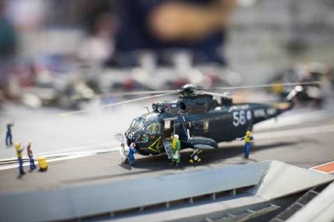 January 19, 2018 - London, London, UK - London, UK. A model helicopter on the flight deck of a model of HMS Ark Royal (R09), built by Dave Fortey, at the London Model Engineering Exhibition at Alexandra Palace. Fortey, a former Royal Navy mechanic and sub-lieutenant, built the model over 25 years. It is the first time it has been put on display to the public. London UK  - ZUMAl94_ 20180119_zaf_l94_020 Copyright: xRobxPinneyx