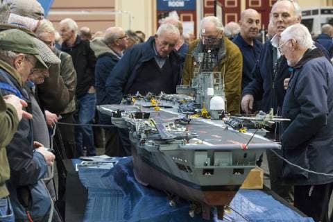 January 19, 2018 - London, London, UK - London, UK. Model engineering enthusiasts admire a model of HMS Ark Royal (R09), built by Dave Fortey, at the London Model Engineering Exhibition at Alexandra Palace. Fortey, a former Royal Navy mechanic and sub-lieutenant, built the model over 25 years. It is the first time it has been put on display to the public. London UK  - ZUMAl94_ 20180119_zaf_l94_024 Copyright: xRobxPinneyx