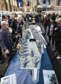 January 19, 2018 - London, London, UK - London, UK. Model engineering enthusiasts admire a model of HMS Ark Royal (R09), built by Dave Fortey, at the London Model Engineering Exhibition at Alexandra Palace. Fortey, a former Royal Navy mechanic and sub-lieutenant, built the model over 25 years. It is the first time it has been put on display to the public. London UK  - ZUMAl94_ 20180119_zaf_l94_030 Copyright: xRobxPinneyx