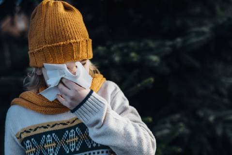 Little boy having a cold, blowing his nose model released Symbolfoto  MJF02218