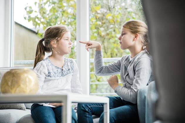 Two girls having a dispute model released Symbolfoto property released  MOEF00516