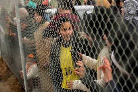 January 28, 2018 - Nuseirat, Gaza Strip, Palestinian Territory - Palestinian women watch the football match between Al-Nuseirat and Al-Jalaa standing outside the fence of the stadium, at Nuseirat refugee camp, in the central of Gaza Strip, on January 28, 2018. Palestinian police allowed women to attending the football match on the first time in Gaza Strip Nuseirat Palestinian Territory - ZUMAap3_ 20180128_zaf_ap3_170 Copyright: xAshrafxAmrax