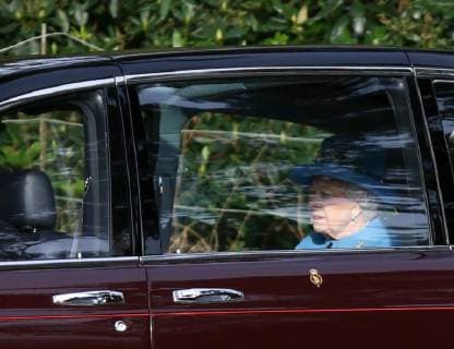 HM Queen Elizabeth II arrives by car before attending the St. Mary Magdalene Church Sunday morning service, in Sandringham, Norfolk, on January 28, 2018 