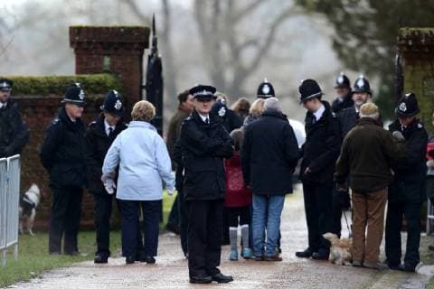 Police officers searching members of the public attending the St. Mary Magdalene Church Sunday morning service, in Sandringham, Norfolk, on January 28, 2018 
