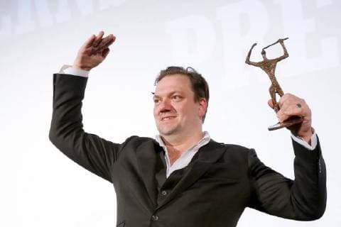 The actor is Charly Huebner on 28 01 2018 with the Ernst Lubitsch Preis for his comedic performance in the film magical mystery or the return of Karl Schmidt honored the traditional trophy he was awarded at a Gala in the Babylon cinema in Berlin Center the Club of Berlin film journalists awards since 1958 the Ernst Lubitsch Preis for best comedic performance in the German movie Berlin Ger