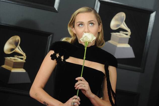 Miley Cyrus arrives on the red carpet at the 60th Annual Grammy Awards ceremony at Madison Square Garden in New York City on January 28, 2018. The CBS network will broadcast the show live from Madison Square Garden in New York City. It will be the first time since 2003 that the ceremony will not be held in Los Angeles.  NYP20180128755 DENNISxVANxTINE