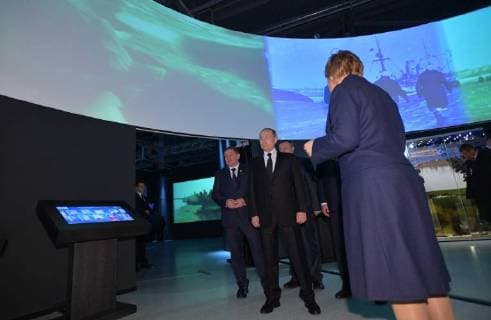 VOLGOGRAD, RUSSIA â€“ FEBRUARY 2, 2018: Volgograd Region Governor Andrei Bocharov and Russia s President Vladimir Putin (L-R) visit the Russia My History museum. Alexei Druzhinin Russian Presidential Press and Information Office TASS  TS072082