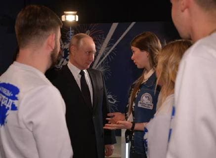 VOLGOGRAD, RUSSIA â€“ FEBRUARY 2, 2018: Russia s President Vladimir Putin (C) meets with members of the Volunteers of Victory movement at the Russia My History museum. Alexei Druzhinin Russian Presidential Press and Information Office TASS  TS072089