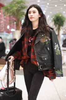 Chinese model Xi Mengyao, better known as Ming Xi, is pictured at the Beijing Capital International Airport in Beijing, China, 8 February 2018. Ming Xi flashes slim figure in casual wear at Beijing airport  20180208_10105