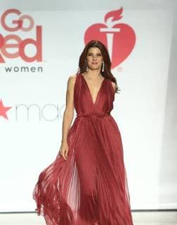 Marisa Tomei walks on the runway at The American Heart Association s Go Red For Women Red Dress Collection 2018 fashion show presented by Macy s at the Hammerstein Ballroom on February 8, 2018 in New York City.  NYP20180208133 SERENAxXU-NING