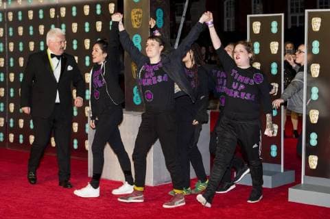 Themen der Woche Bilder des Tages February 18, 2018 - London, London, UK - Times Up protesters on the red carpet for the EE British Academy Film Awards 2018, held at the Royal Albert Hall. London UK  - ZUMAt138 20180218_zap_t138_125 Copyright: xRayxTangx