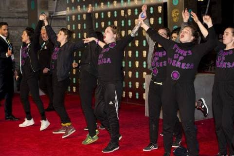 February 18, 2018 - London, London, UK - Times Up protesters on the red carpet for the EE British Academy Film Awards 2018, held at the Royal Albert Hall. London UK  - ZUMAt138 20180218_zap_t138_128 Copyright: xRayxTangx