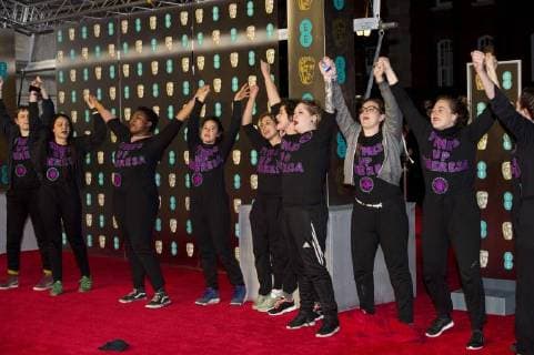 February 18, 2018 - London, London, UK - Times Up protesters on the red carpet for the EE British Academy Film Awards 2018, held at the Royal Albert Hall. London UK  - ZUMAt138 20180218_zap_t138_130 Copyright: xRayxTangx