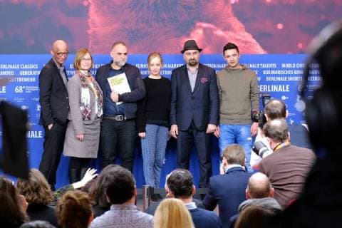 Director Karim Ainouz Actor Qutaiba Nafea and Ibrahim Al Hussein with the Amnesty International Film Award for the film CENTRAL AIRPORT THF on the occasion of the award ceremony of the 68 Berlin International Film Festival snapshot photography xSeeliger