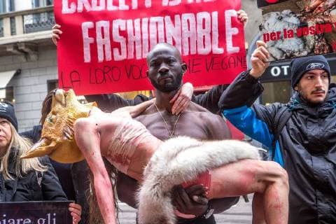 February 24, 2018 - Milan, Italy - Animal-rights activists protest during the Milan Fashion Week against the use of fur coats in the fashion industry in Milan, Italy, on 24 February 2018. Milan Italy  - ZUMAn230 20180224_zaa_n230_104 Copyright: xMairoxCinquettix