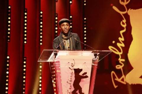 Samuel Ishimwe speaks after receiving the Silver Bear Prize of the jury Short film category for Imfura during the closing ceremony of the 68 Berlinale of the Berlin International Film Festival Samuel Ishimwe speaks after receiving the Silver Bear Prize of the jury Short Film Category for Imfura during the closing ceremony of the 68 Berlinale Internationale Berlin Film Festival in the Berlinale Pala