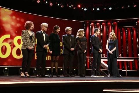 Judges of the Berlinale LR Stephanie Zacharek Ryuichi Sakamoto Adele Romanski Chema Prado Cecile de France Jury President Tom Tykwer and presenter Anke Engelke on stage for the 68 Berlinale on 24 02 2018 in Berlin in the jury members of the Berlinale LR Stephanie Zacharek Ryuichi Sakamoto Adele Romanski Chema Prado