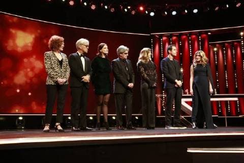 Judges of the Berlinale LR Stephanie Zacharek Ryuichi Sakamoto Adele Romanski Chema Prado Cecile de France Jury President Tom Tykwer and presenter Anke Engelke on stage for the 68 Berlinale on 24 02 2018 in Berlin in the jury members of the Berlinale LR Stephanie Zacharek Ryuichi Sakamoto Adele Romanski Chema Prado